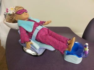 Doll in spa chair